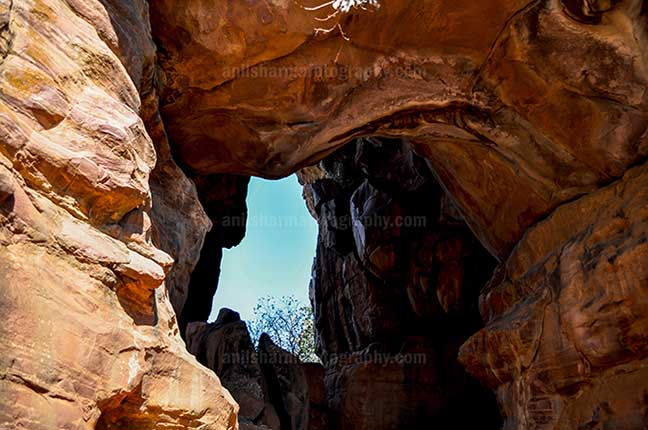 Archaeology- Bhimbetka Rock Shelters - Interior of a cave at Bhimbetka archaeological site at raisen, Madhya Pradesh, India. by Anil Sharma Photography