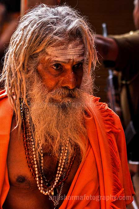 Culture- Naga Sadhu\u2019s (India) - Close-up of an old Naga Sadhu wearing beads mala at Varanasi. by Anil Sharma Photography