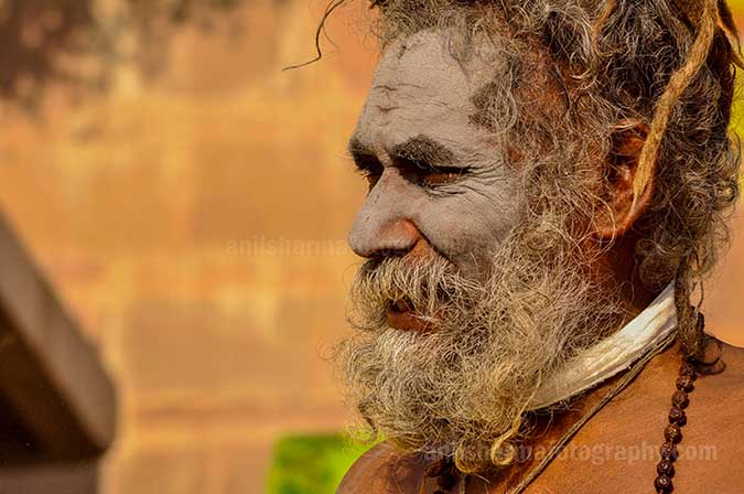 Culture- Naga Sadhu\u2019s (India) - Smile on the face of an elderly Naga Sadhu at Ghat. by Anil Sharma Photography