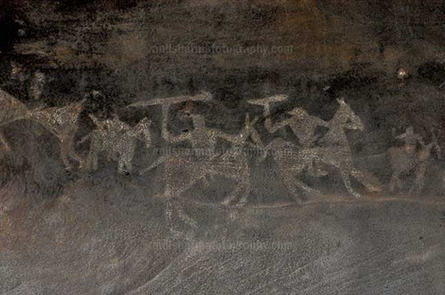 Archaeology- Bhimbetka Rock Shelters - Prehistoric Rock Painting of Worriars on horses in the battle field at Bhimbetka archaeological site by Anil Sharma Photography
