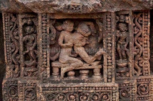 Richly carved erotic sculptures at Konark Sun Temple near Bhubaneswar, Orissa, India..