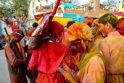 Festivals- Lathmaar Holi of Barsana (India) - Local people daubed in color powder during Lathmaar Holi celebration at Barsana, Mathura, Uttar Pradesh, India.