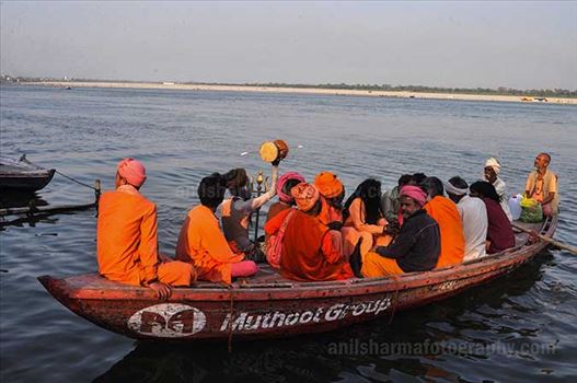 A group of Naga Sadhu's on a Boat returning to their camps at Varanasi.