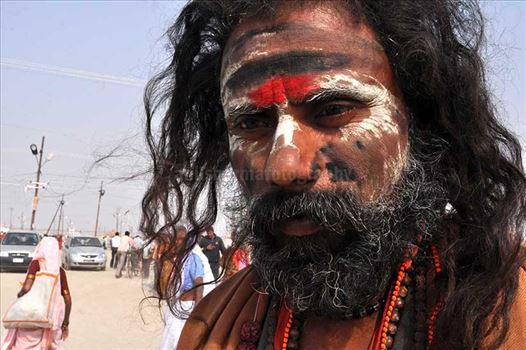 Aghori Sadhu with long hairs, ash and tilak on face wearing rudraksha bead at Mahakumbh mela, Allahabad, Uttar Pradesh, India.