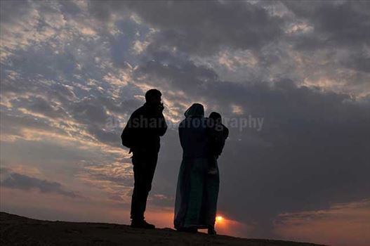 A family enjoying sunset scene at Jaisalmer.